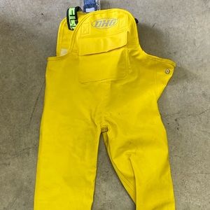 Bright yellow rain pants
